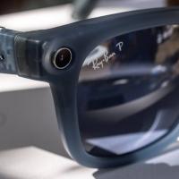 Close-up image of the camera lens in a pair of Rayban sunglasses